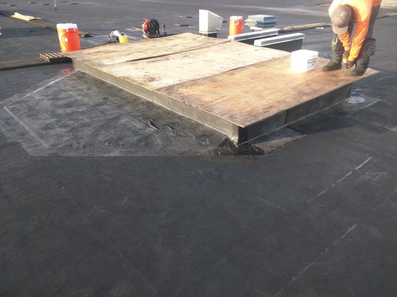 Epdm Roof Being Inspected